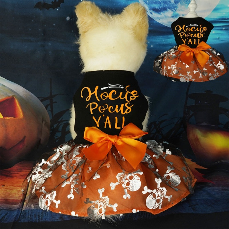 Pet Clothes Halloween costume with a black bodice, orange bow, and rust-colored skirt patterned with white skulls and bones.