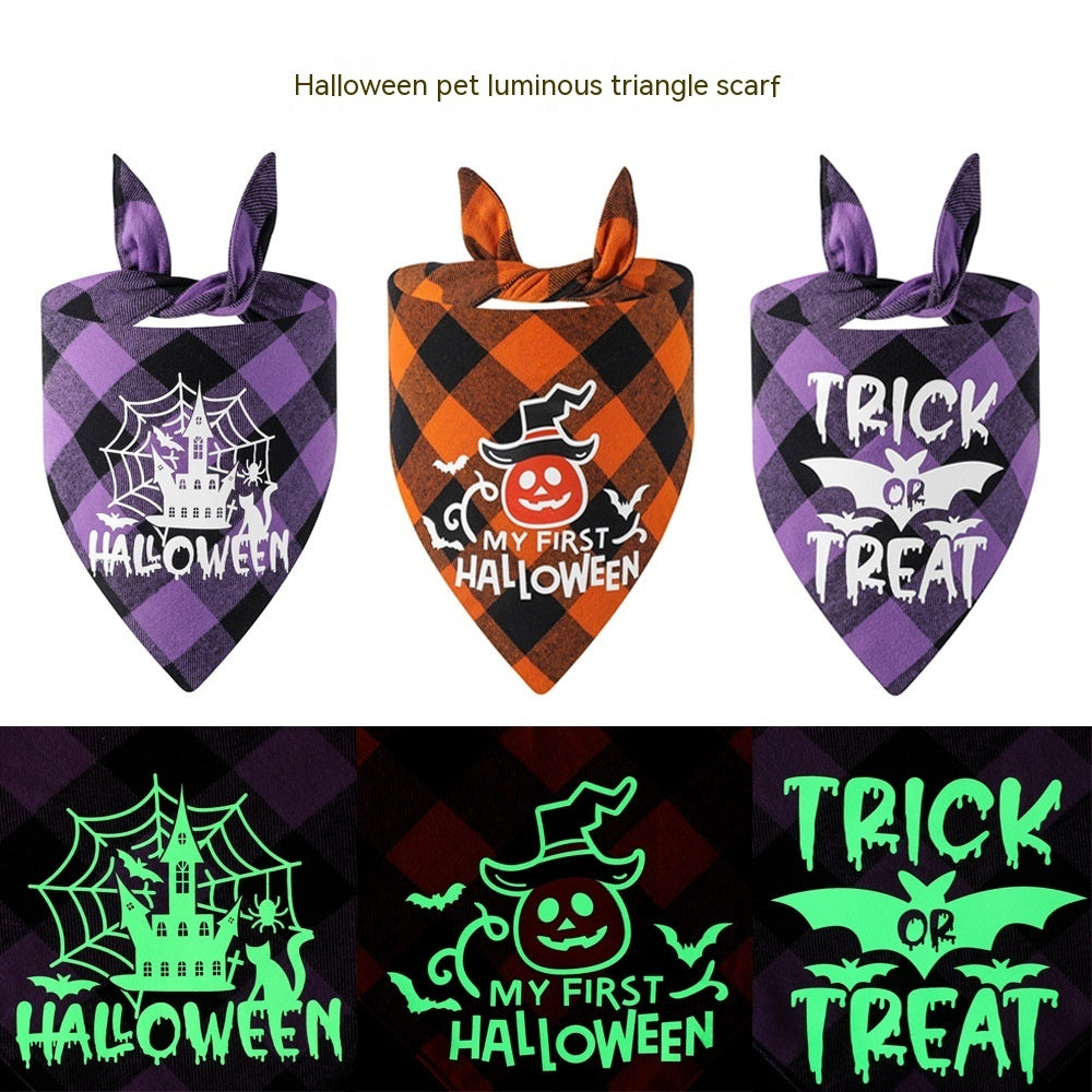 Dog bandana in purple and orange cotton plaid, with Halloween castle, pumpkin and trick-or-treat prints that glow in the dark; Plaid Luminous Halloween style.