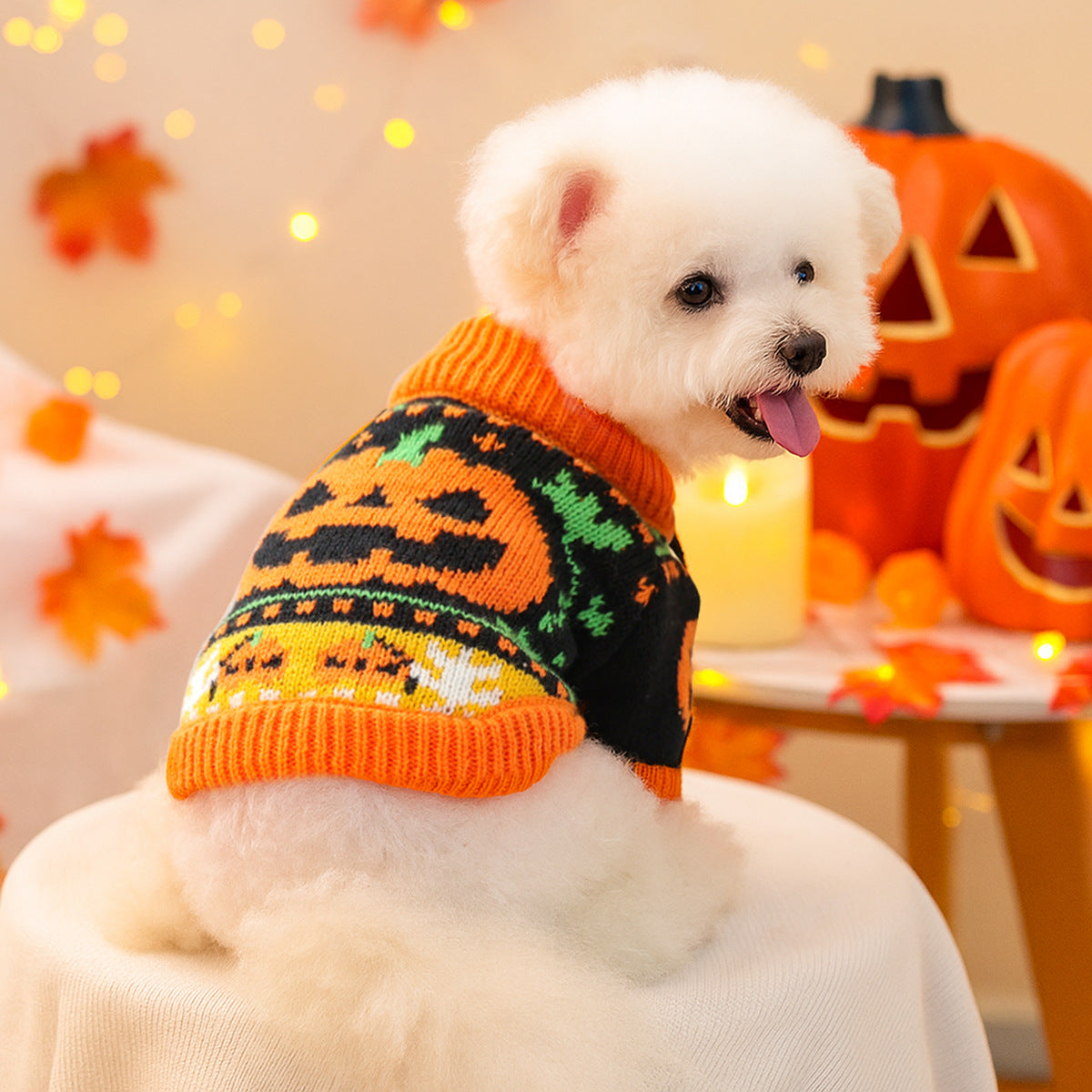 Dog sweater, Fashion Personality Halloween, black knit with orange pumpkin motifs, green accents, and ribbed orange trim.