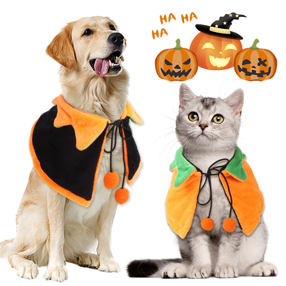 Halloween Pumpkin Double-sided Dog Cloak in plush orange and black, with pointed collar, black ties and dangling pom-poms.