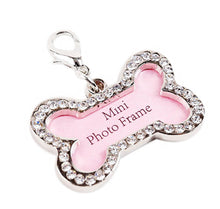 Bone-shaped mini photo frame with gemstone embellishments.